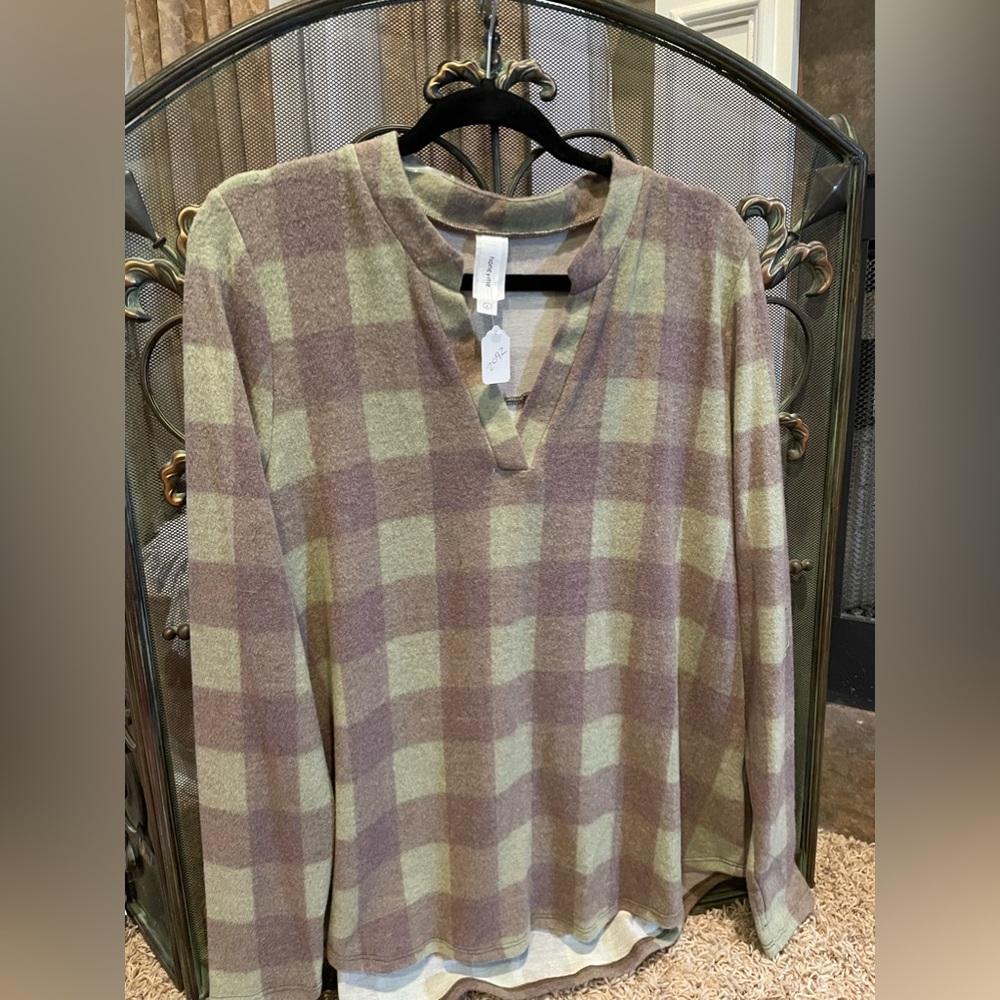 NEW with tags.. super soft plaid sweater
